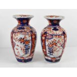 A pair of late 19th century Imari pattern vases, 20cm high.