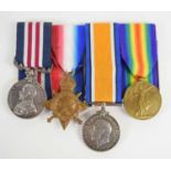 A WWI medal group awarded to 2nd Lieut E.F Tomlison 3375 comprising of the Military Medal, 1914-1915