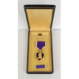 A U.S Army Purple Heart medal with original fitted case.