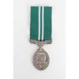 A George VI Auxiliary Air Force Air Efficiency Medal awarded to Cpl J.R Cross, 815084.