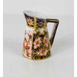 A Royal Crown Derby miniature Imari pattern jug