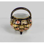 A Royal Crown Derby miniature Imari pattern cauldron.