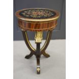 An early 20th century French empire circular rosewood table, with a later painted floral rosewood