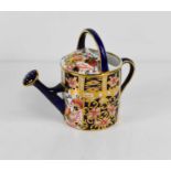 A Royal Crown Derby miniature Imari pattern watering can.