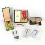 A group of military medals to include a Liberation of Kuwait medal, Greek war cross, Operational