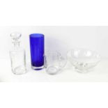 A Dartington glass bowl, together with a blue glass vase, stylish decanter and jug.