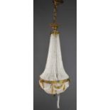 A French gilt metal mounted glass chandelier of basket form, with ribbon and bow decoration, 65cm