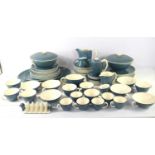 A Poole "Blue Moon" pottery tea and dinner set comprising of cups, saucers, teapot, toast rack, soup