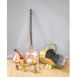 A group of brass and copper ware to include a brass coal scuttle, candlesticks, copper jug and other