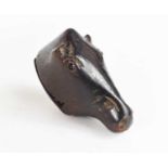 A 19th century wooden snuff box carved in the form of a horses head with hinged lid to the neck.