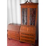 An Edwardian bureau bookcase with glazed upper section and having inlaid decoration together with