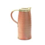 Stephen Parry (1950-): A stoneware jug with grey glaze to the rim, 22cm high.
