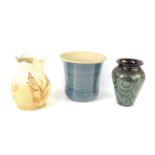 A group of studio pottery to include a large blue glazed vase by Huw Powell Roberts 24cm high, a