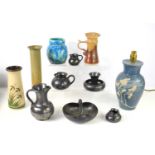 A group of studio pottery to include Prinknash jugs, a blue glaze table lamp by Huw Powell