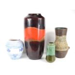 A group of West German pottery vases to include a large lava vase in a red and brown glaze, a