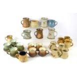 A group of studio pottery mugs to include examples by Rashleigh pottery, Darwinware, Stanion, Iden