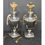 A pair of French chrome plated metal urn form table lamps, with scroll handles, 70cm high. One of