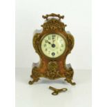 An early 20th century Louis XVI style mantle clock by Lenzkirk of Germany, Roman numeral dial,