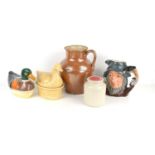A group of ceramics to include a duck dish with lid, a stone ware jug, Royal Doulton character jug