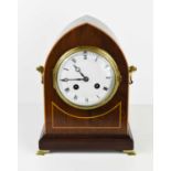 A late 19th century Vincent & Cie mahogany mantle clock with Roman numeral dial, stamped to the