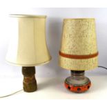 A vintage West German lava style squat table lamp together with a studio pottery lamp base.