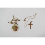 A 9ct gold cross pendant and necklace together with a gold plated locket pendant and necklace, 2.