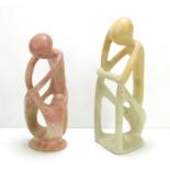 Two soapstone abstract sculptures, one depicting interwoven figures, 29cm.