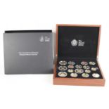 A Royal Mint 2013 United Kingdom Premium Proof Sixteen Coin Set, in a wooden fitted case and with