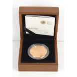 A Royal Mint, 2010 Brilliant Uncirculated gold £5 Sovereign, 39.94g, with certificate and case,