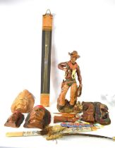 A large vintage cowboy sculpture made by Universal Statuary Corp USA, together with Native