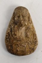 A small ancient Egyptian stone carving of a pharaoh, 4cm by 2.5cm.