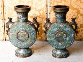 A pair of large and impressive Chinese cloisonne bronze metal moon flasks, modelled with dog of fo