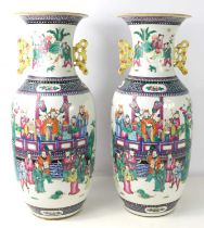 A pair of 20th century Chinese floor vases, painted with warriors, flowers and insects with yellow