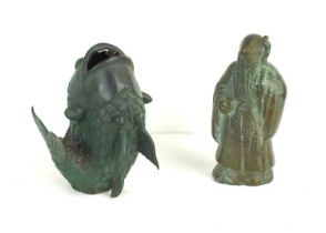 A Chinese bronze fish vase with open mouth, balanced on curved tail, 13cm high and a Chinese