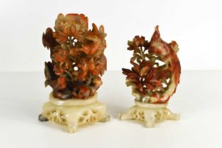 A near pair of Chinese agate carvings, one of songbirds amongst tree peonies, the other a bird of