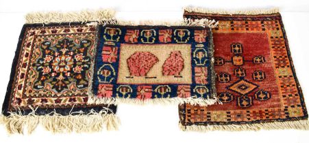 Three Tribal Persian panels, early to late 19th century, one example a Persian Afshar saddle bag