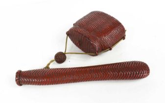 A Japanese Inro and fan case, both of red cinnabar lacquer in basket weave design, complete with
