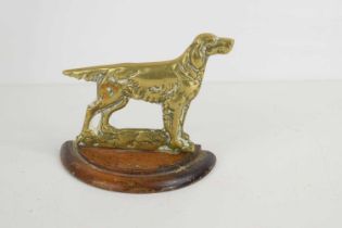 A Victorian brass ornament of a Labrador or Retriever dog, 11cm high.