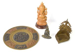 A cast bronze oil lamp, Tamil Nadu region, 12cm high together with a carved figure of Ganesha, an