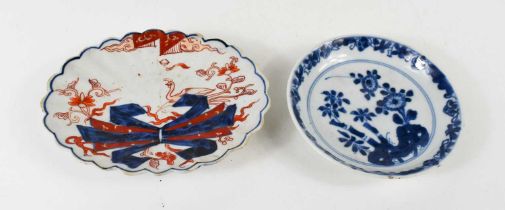 A blue and white saucer, or pin dish, likely 18th century Qing Dynasty, 12cm diameter and a small