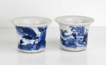 A pair of 19th century Chinese blue and white brush washes, one depicting two figures with a