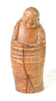 A Chinese carved bamboo figure of a standing Buddha, or deity, 39cm high.