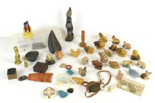A group of collectables to include Wade Whimsies, Native American decorated black stone, turquoise