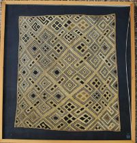 A Kudo tribal wall hanging, framed and glazed, 66 by 52cm.