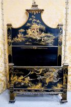 A fine Chinese single bed, the head board decorated with figures and foliage, and a pagoda in rich
