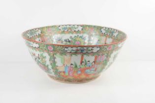 A large 20th century Canton Famille Rose bowl, decorated throughout with reserves depicting interior