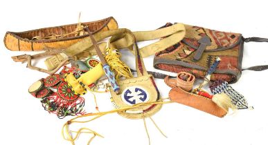 A group of Native American items to include a hide shoulder pouch decorated with coloured woven