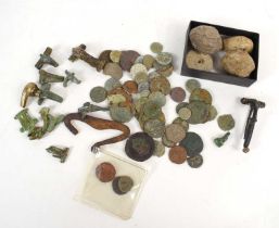 A collection of Roman coins, lead steelyard weights and a group of Roman brooches to include a