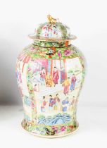 A 19th century Canton, Famille Rose jar and cover, the baluster form vase decorated with courtly