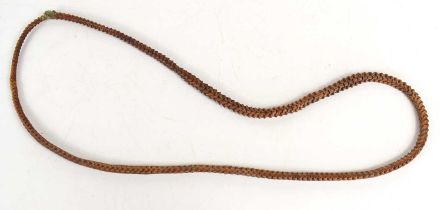 An antique snake vertebrae necklace, possibly Native American, 86cm total length.